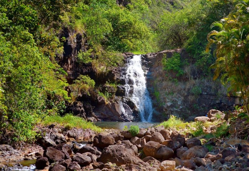 Waimea Falls tropical waterfall in Waimea Valley park on Oahu