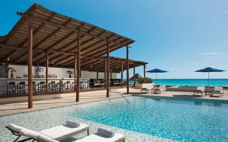 Ocean front pool bar at Secrets The Vine Cancun