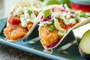 two fish tacos on a plate