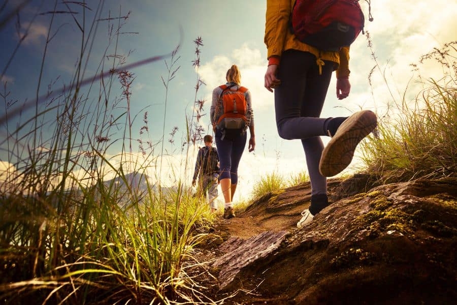 group of well equipped people hiking