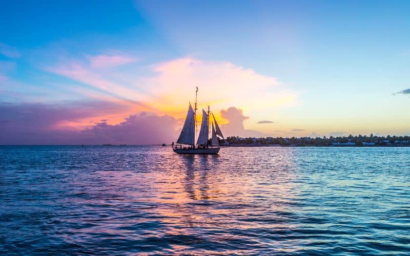 Sunset at Key West with sailing boat
