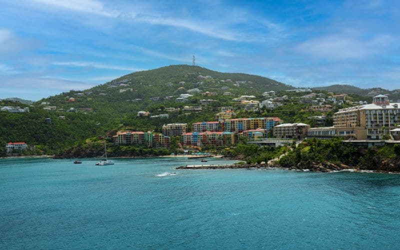 A scenic view of St Thomas with hotels condos and turquoise water (1)