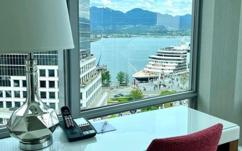 Auberge Vancouver Hotel with cruise ship in the background