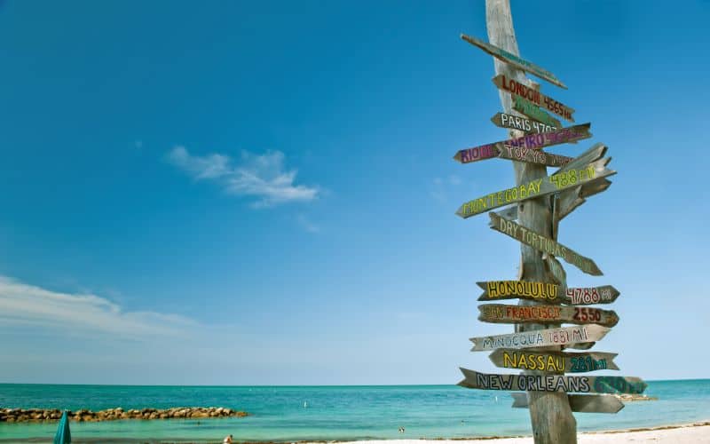 Mileage milepost on beach in Key West Florida