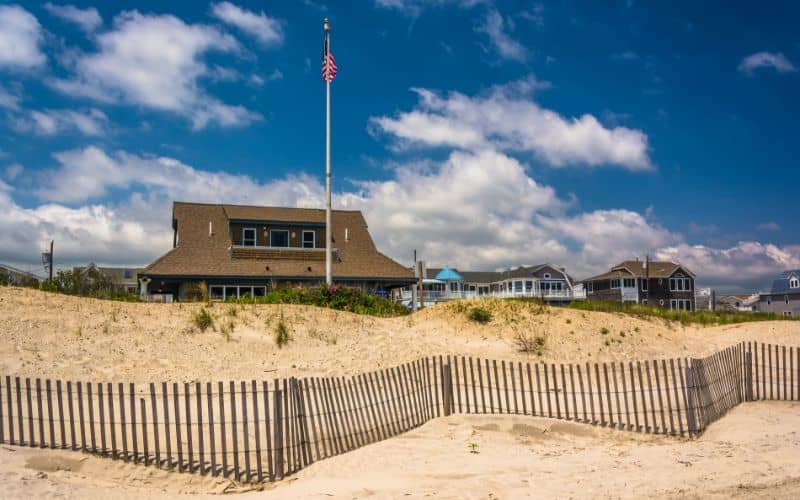 Sand dunes and houses in Ocean City New Jersey