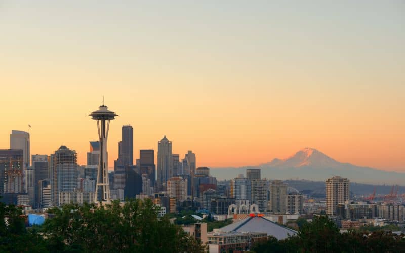 Seattle city skyline with Mt Rainier at sunset viewed from Kerry Park
