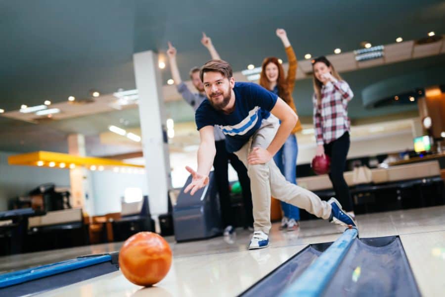 friends having fun at a bowling alley