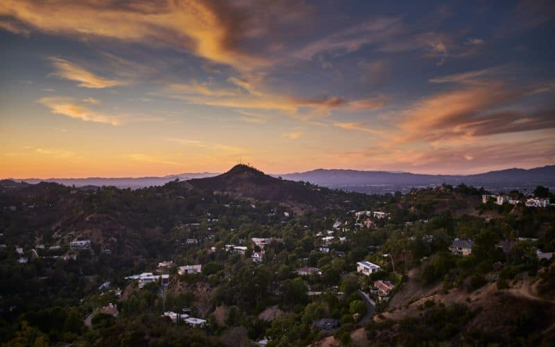 hollywood hills at dusk with colorful sky shot from runyon canyon