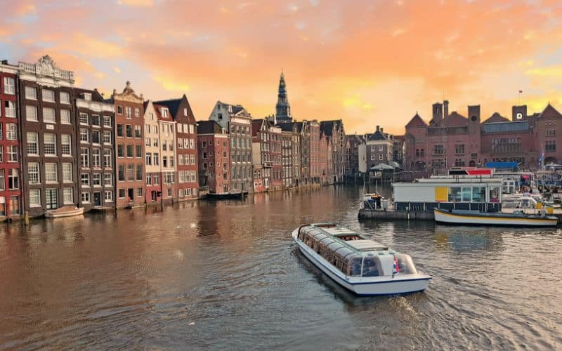 Canal cruise in Amsterdam at sunset