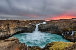 Beautiful sunrise in majestic waterfall Aldeyjarfoss iceland