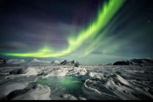 Frozen fjord & Northern Lights in winter iceland