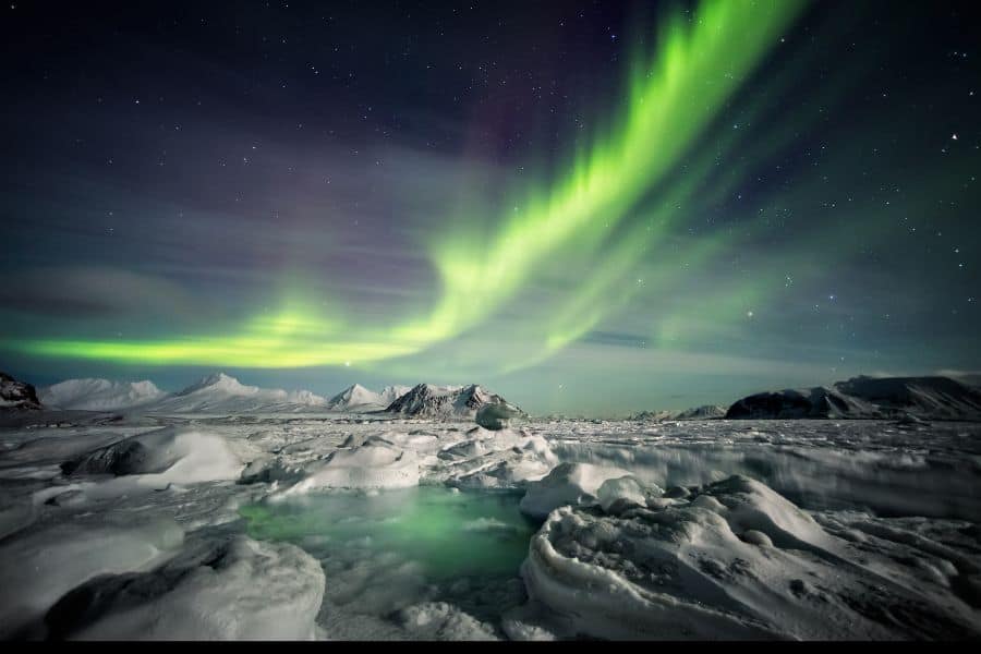 Frozen fjord & Northern Lights in winter iceland