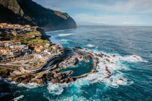 Aerial view of Porto Moniz with volcanic lava swimming pools Madeira Portugal