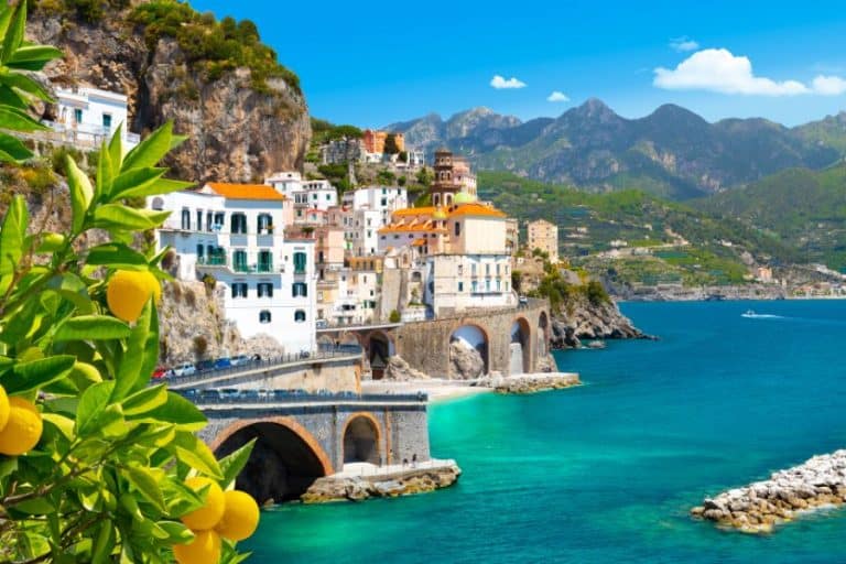 Beautiful view of Amalfi on the Mediterranean coast with lemons in the foreground Italy