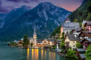 Hallstatt village in Alps and lake at dusk Austria Europe