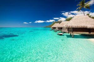 Villas on the tropical beach with steps into water Mo'orea French Polynesia