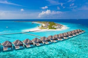aerial view of maldives with overwater bungalows