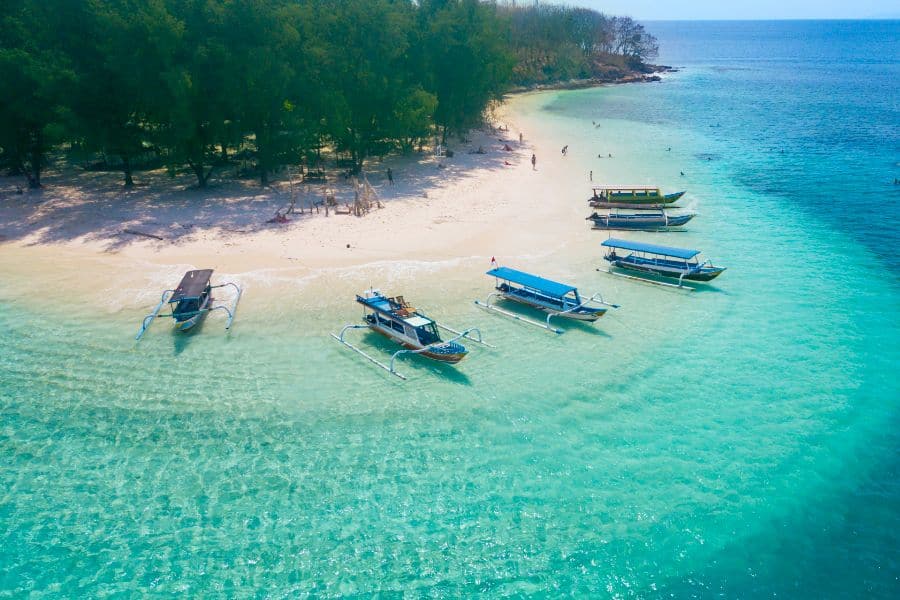 boats anchored on the Gili Rengit beach