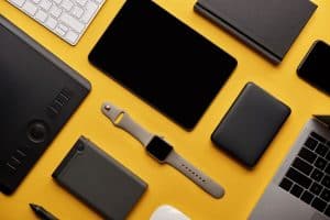 different wireless devices on yellow surface