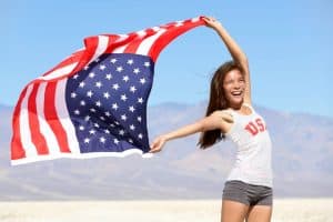 woman holding the american flag