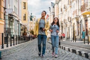 young man and woman traveling and sightseeing