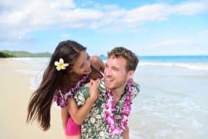 Couple having fun laughing in Hawaii