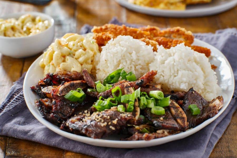 Hawaiian bbq plate with mix of chicken katsu korean kalbi beef short ribs rice and macaroni salad