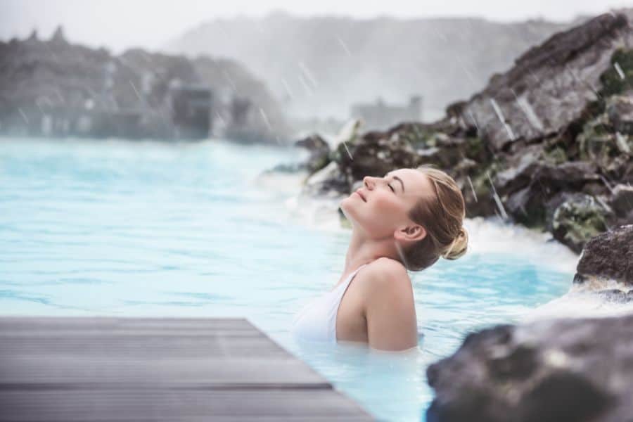 Woman enjoying natural spa Blue Lagoon