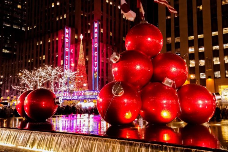 Christmas Holiday decorations in New York City with Radio City Music Hall Christmas Tree in the background New York USA