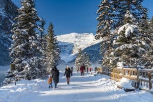 Tourists sightseeing at Lake Louise in early winter