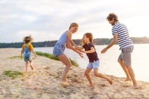 family of four spending the day at the beach