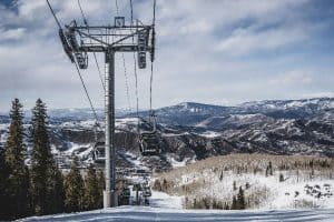 cable cars over snow covered mountain aspen colorado sp