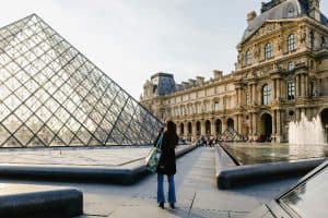 Woman Taking Photo Of louvre sp