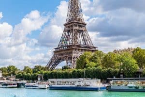 eiffel tower on sunny day with view of river sp