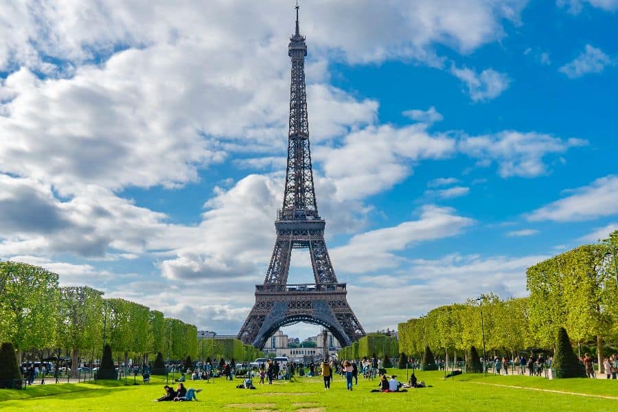 The Eiffel Tower against a Cloudy Sky Paris France sp