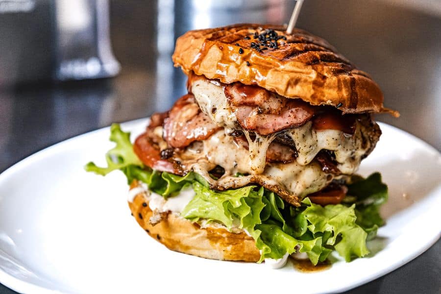 Hamburger tomato meat delicious food Juicy beef burger on a plate